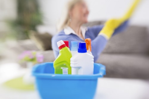 Vacuuming curtains to remove dust and allergens